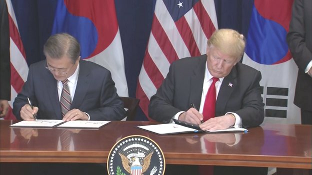 Pres Moon and Pres Trump sign the revised US-South Korea Free Trade Agreement. I've never seen my name in Korean, said @POTUS. It looks nice.   