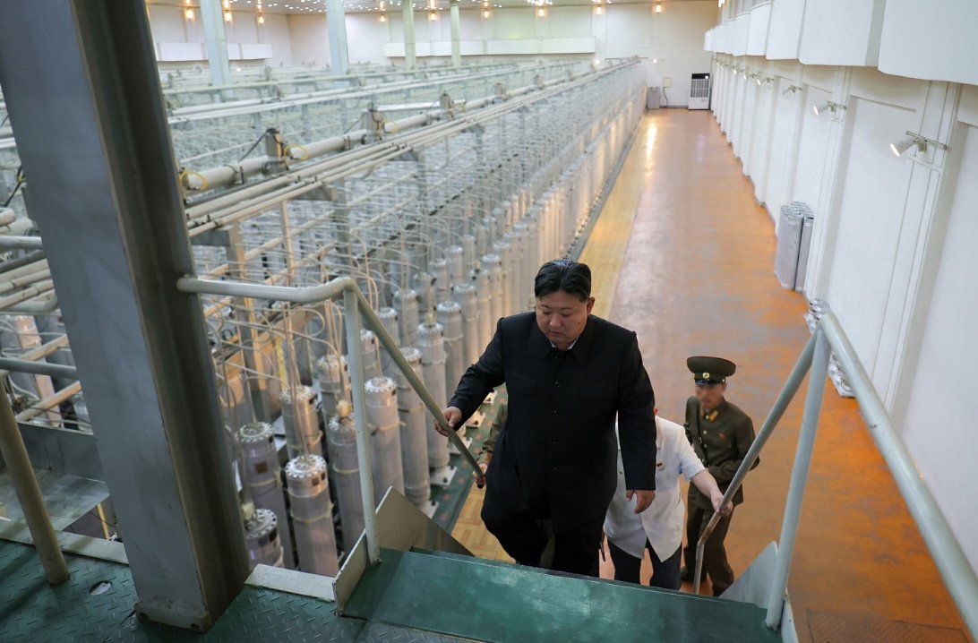 New pictures of Kim Jong Un inspecting a uranium enrichment facility: new centrifuges, and quite a bit of SWU visible