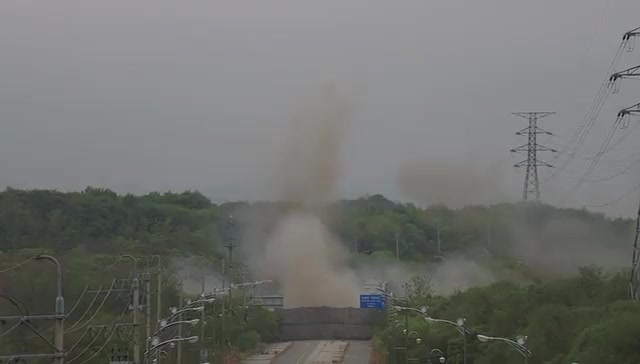 South Korean military releases new video of North Korea blowing up 2 road / railways that used to connect the Koreas