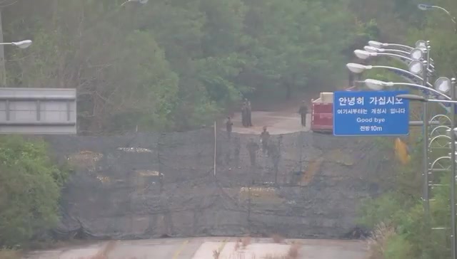 South Korean military releases new video of North Korea blowing up 2 road / railways that used to connect the Koreas