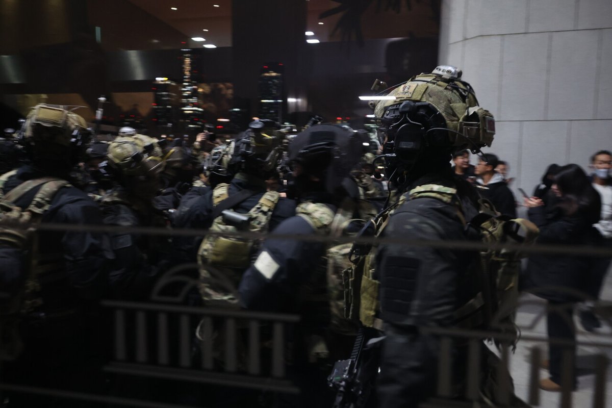 Armed special forces unit soldiers are about to storm South Korea's parliament after President Yoon declared the martial law, clashing with parliamentary aides of the main opposition Democratic Party who are trying to stop them