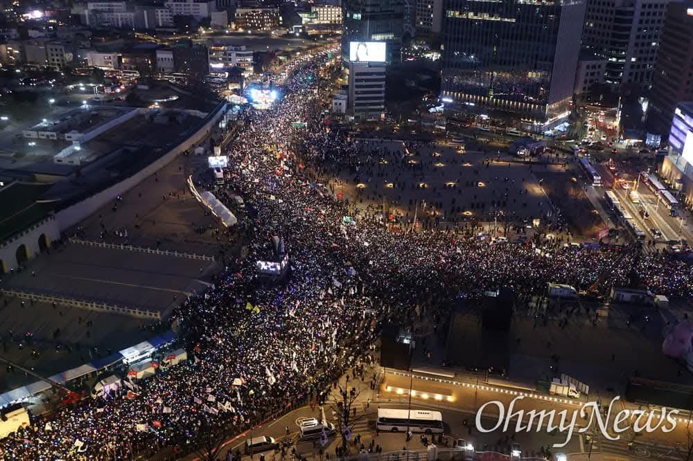 Hundreds of thousands of South Koreans march through central Seoul demanding the immediate resignation of Yoon Suk Yeol, undeterred by sub-zero temperatures. On the last Saturday of 2024, an ocean of cheering sticks shine like stars, lighting the bitter cold night of Seoul as more than 500,000 South Koreans protest to demand Yoon Suk Yeol resign over his short-lived martial law decree